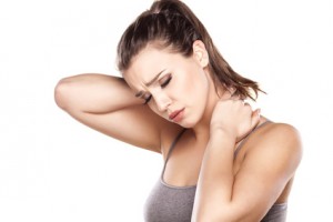 beautiful young woman has a pain in the neck